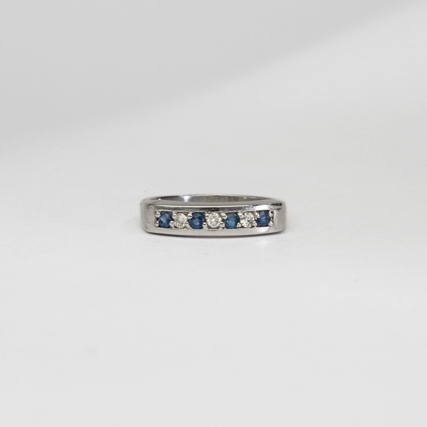9ct white gold ring with blue sapphires and diamonds by D E Jewellery