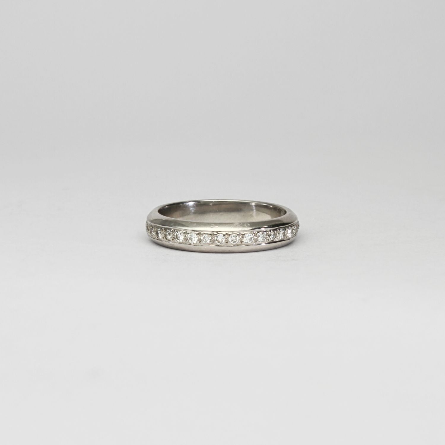 Platinum full eternity ring with diamonds by D E Jewellery