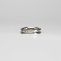 18ct white gold ring with princess cut diamonds by Duncan Eves