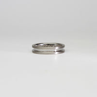 18ct white gold ring with princess cut diamonds by Duncan Eves