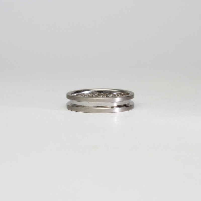 18ct white gold ring with princess cut diamonds by Duncan Eves