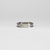 18ct white gold ring with princess cut diamonds by Duncan Eves
