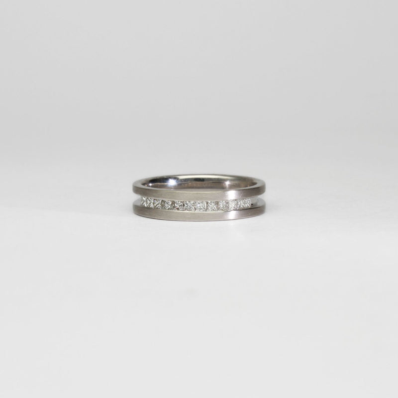 18ct white gold ring with princess cut diamonds by Duncan Eves