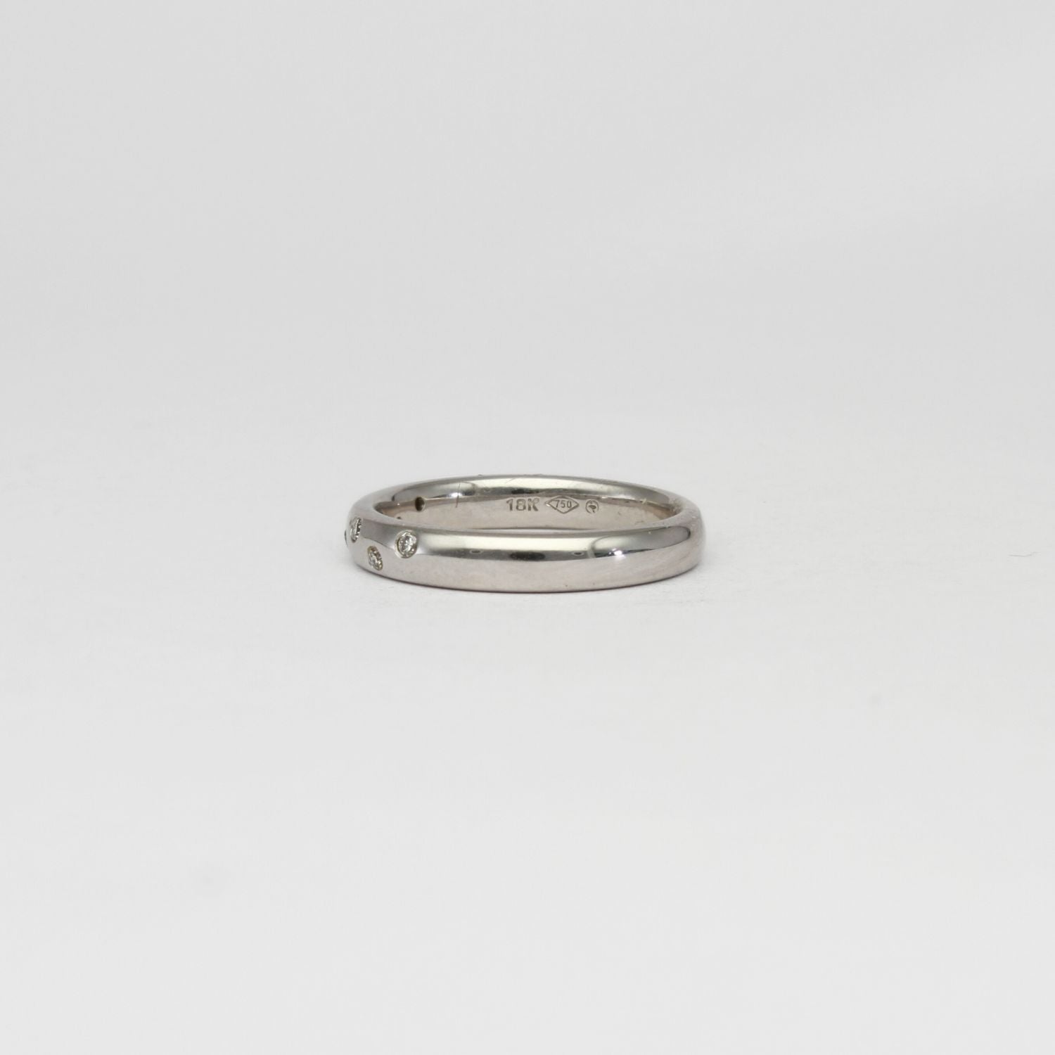 18ct white gold ring with 7 diamonds by Duncan Eves