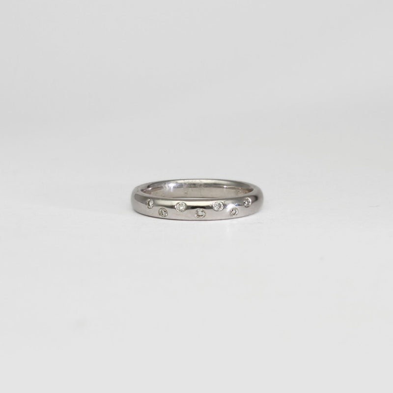18ct white gold ring with 7 diamonds by Duncan Eves