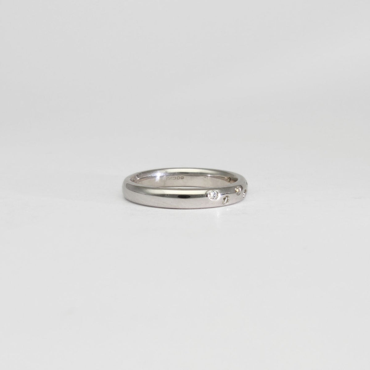18ct white gold ring with 7 diamonds by Duncan Eves