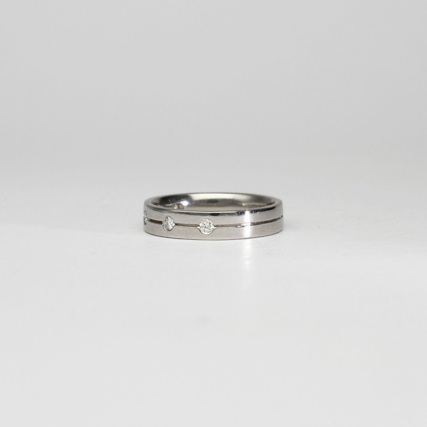 Platinum ring with 5 diamonds by Duncan Eves