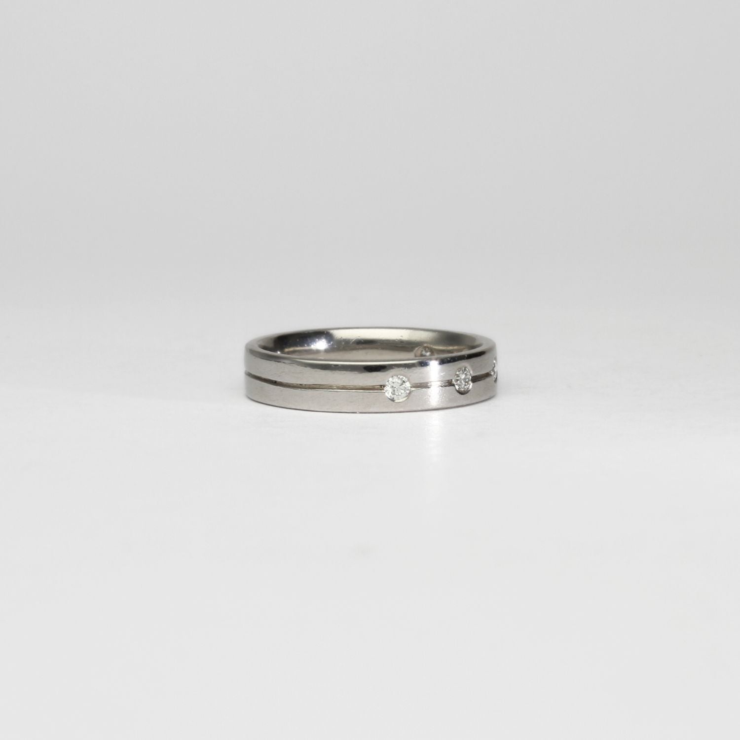 Platinum ring with 5 diamonds by Duncan Eves