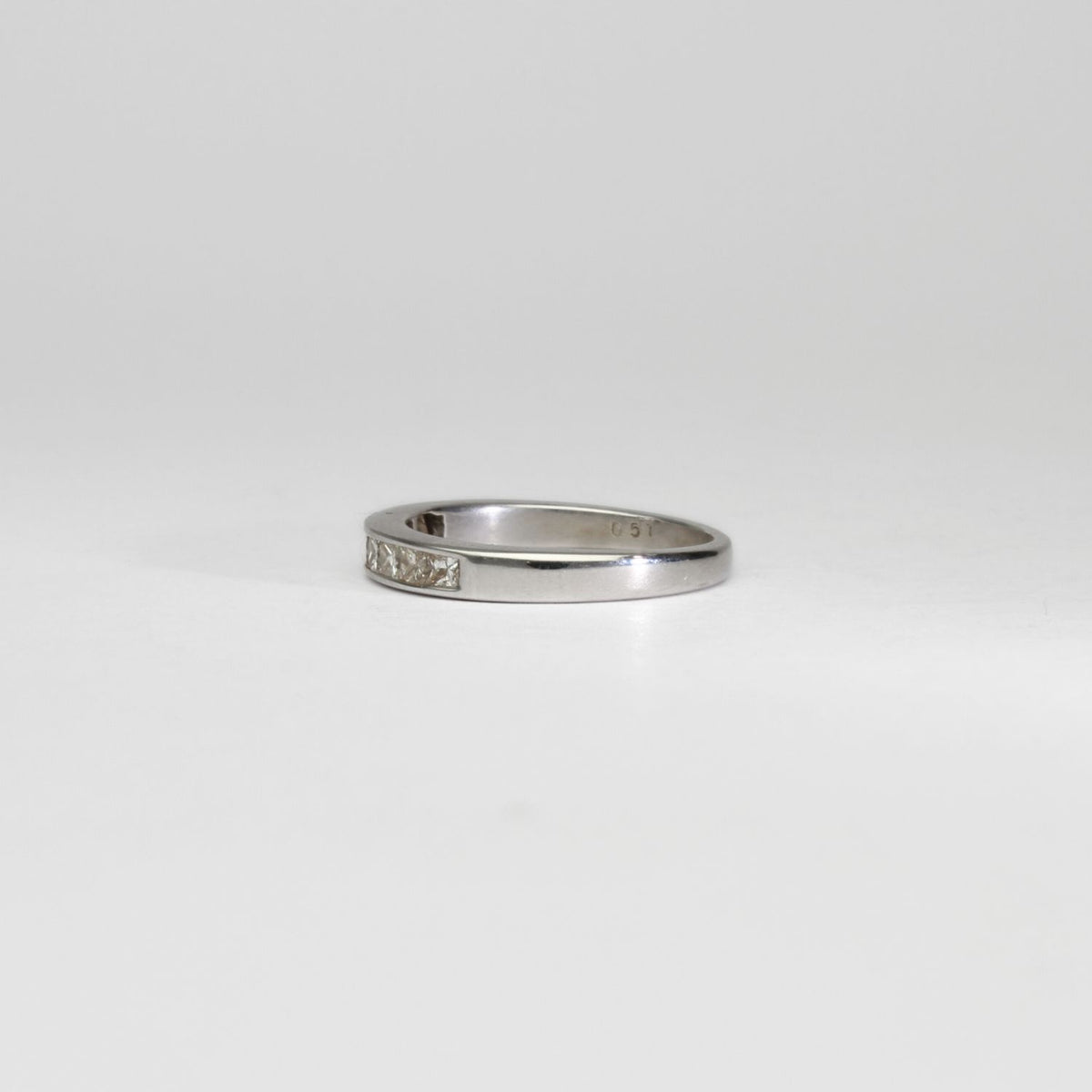 18ct white gold ring with 8 princess cut diamonds by Duncan Eves