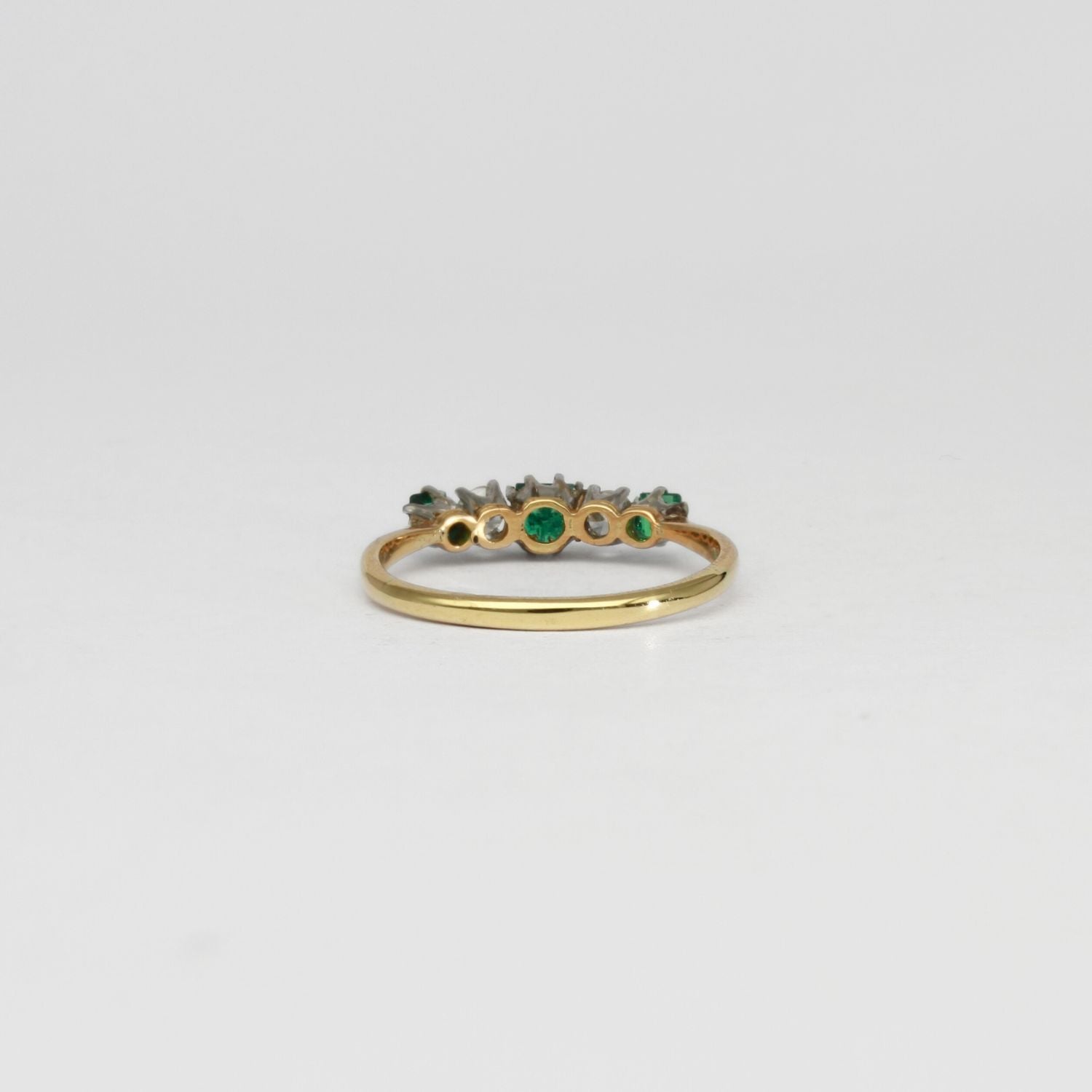 18ct gold ring with emeralds and diamonds by Duncan Eves