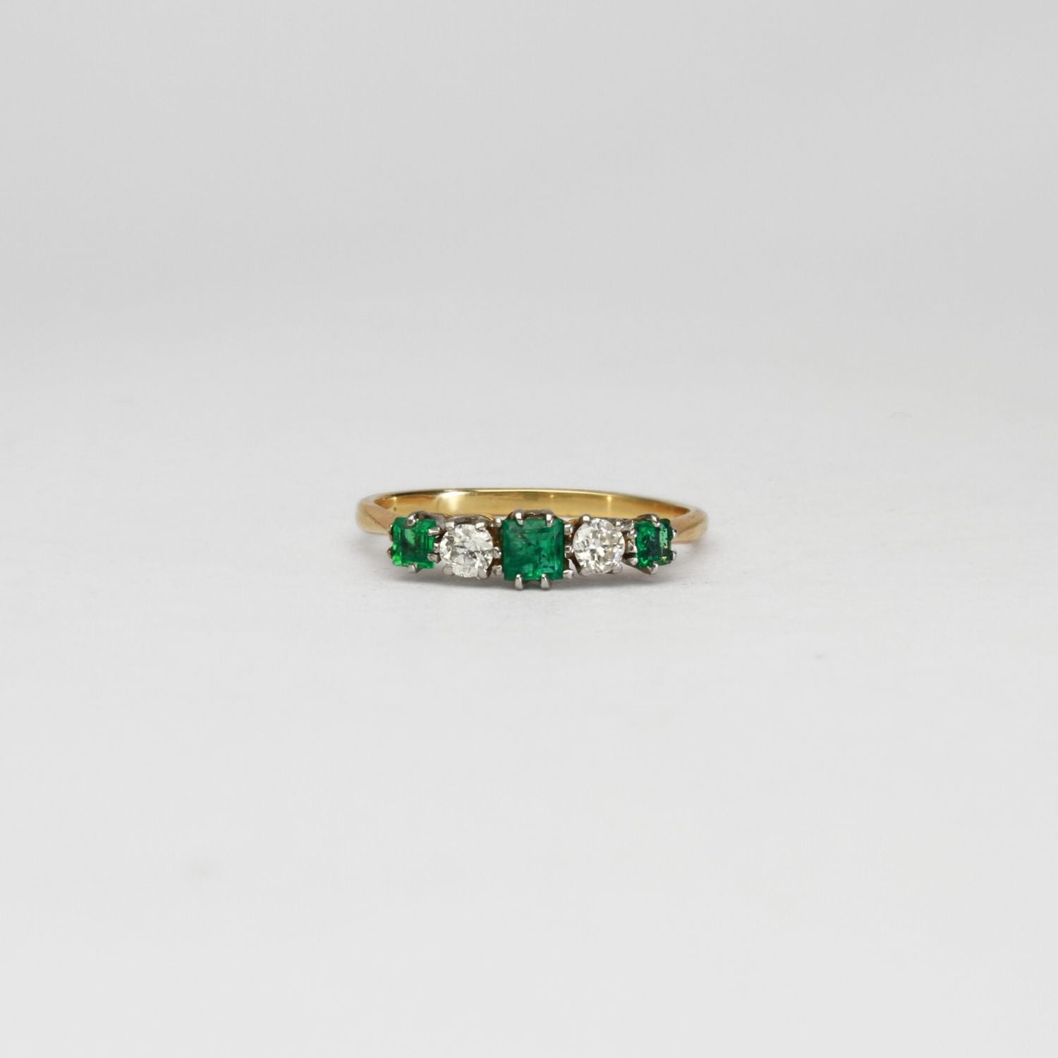 18ct gold ring with emeralds and diamonds by Duncan Eves