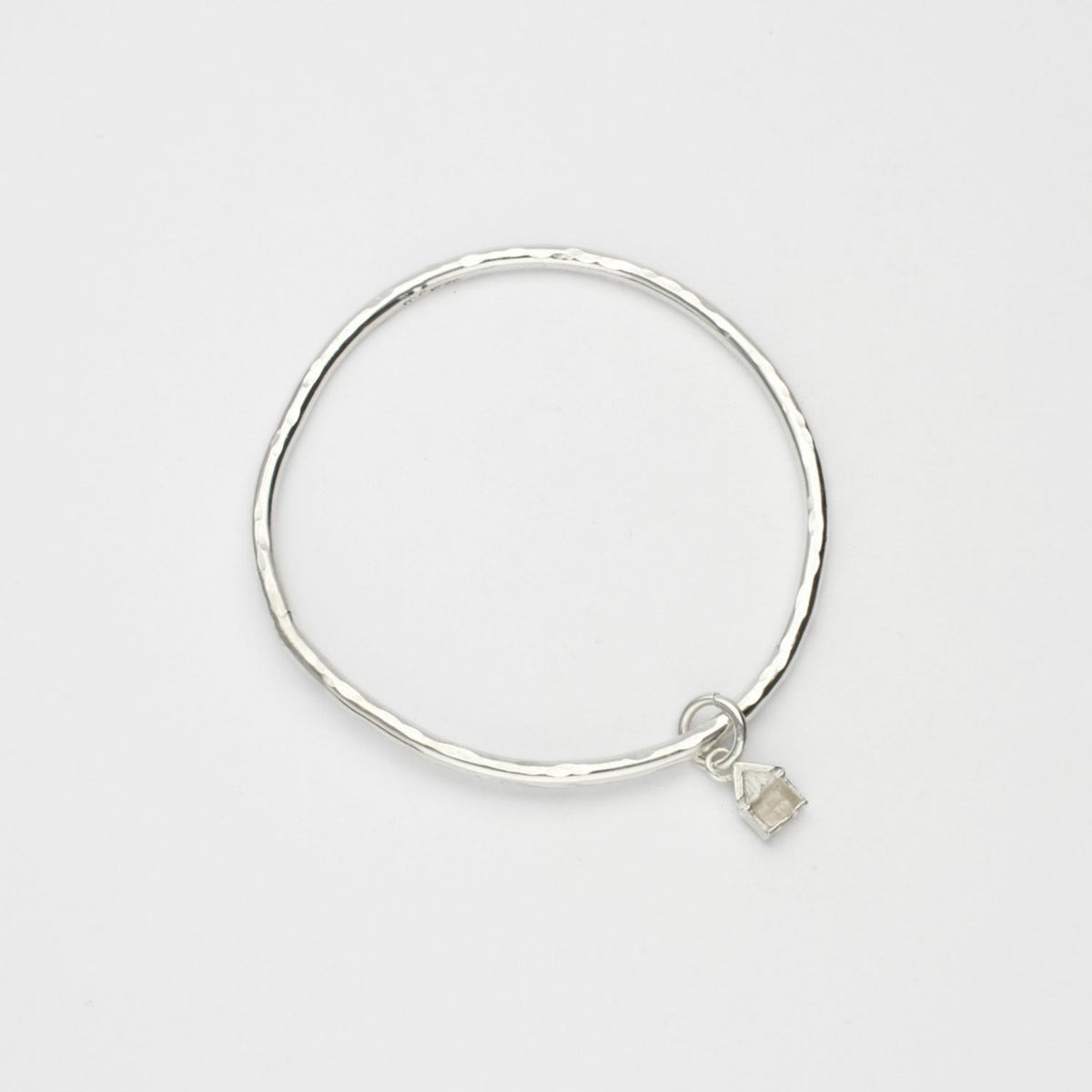 Beach hut silver charm bangle by Emily Craig