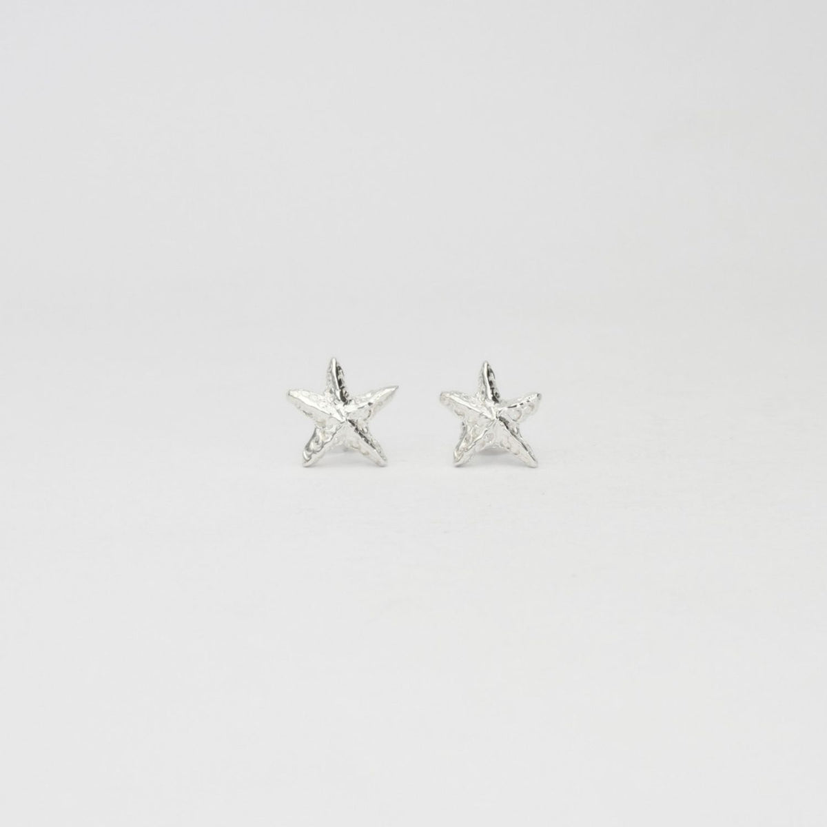 Starfish silver stud earrings by Emily Craig