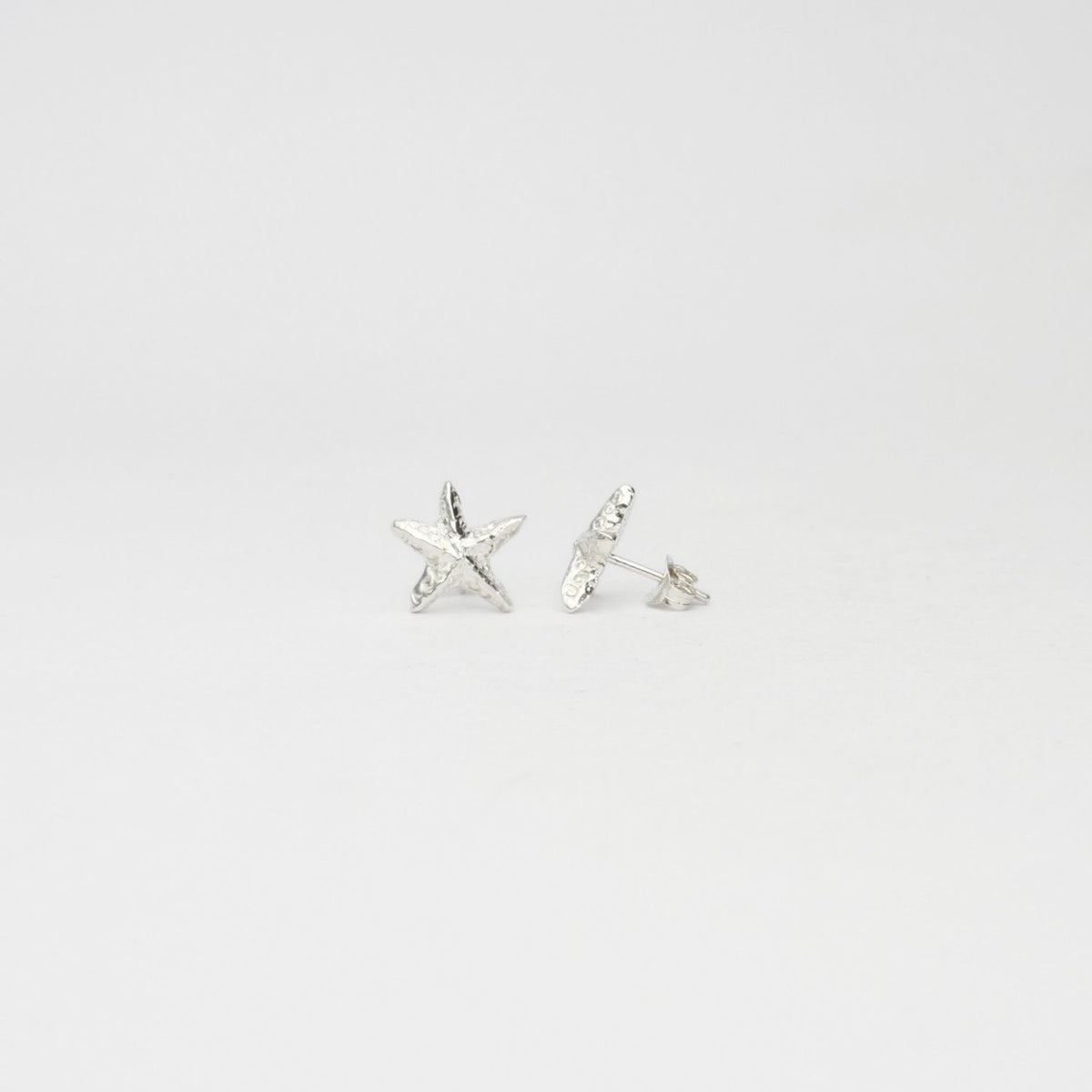 Starfish silver stud earrings by Emily Craig