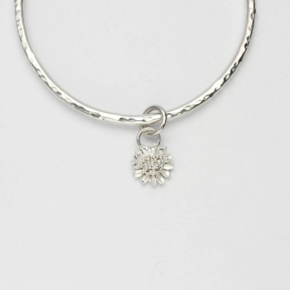 Sunflower silver charm bangle by Emily Craig