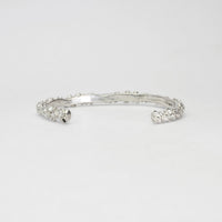 Rockpool silver torque bangle with sapphires by Emily Craig