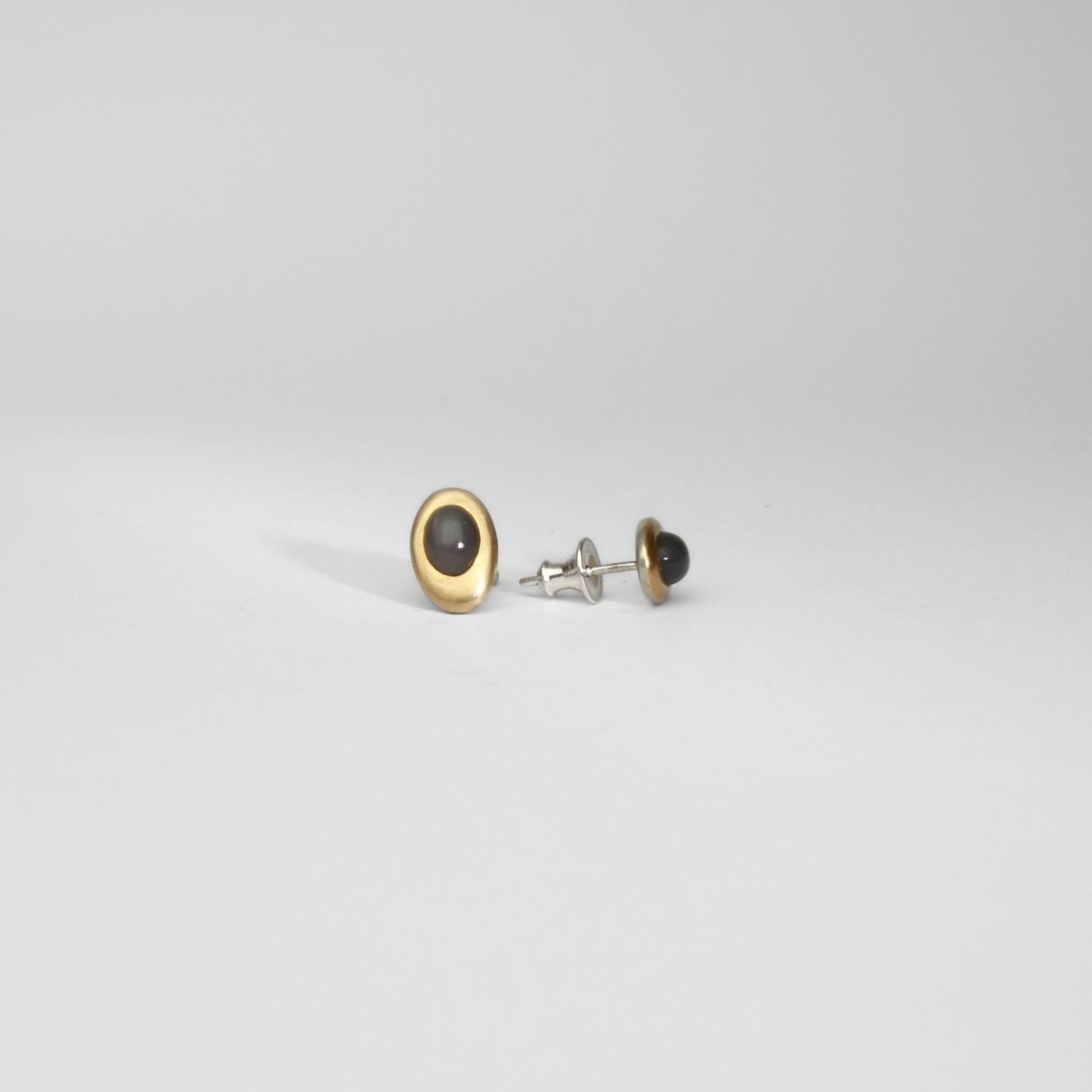 Grey moonstone silver & 18ct gold studs by Emily Thatcher