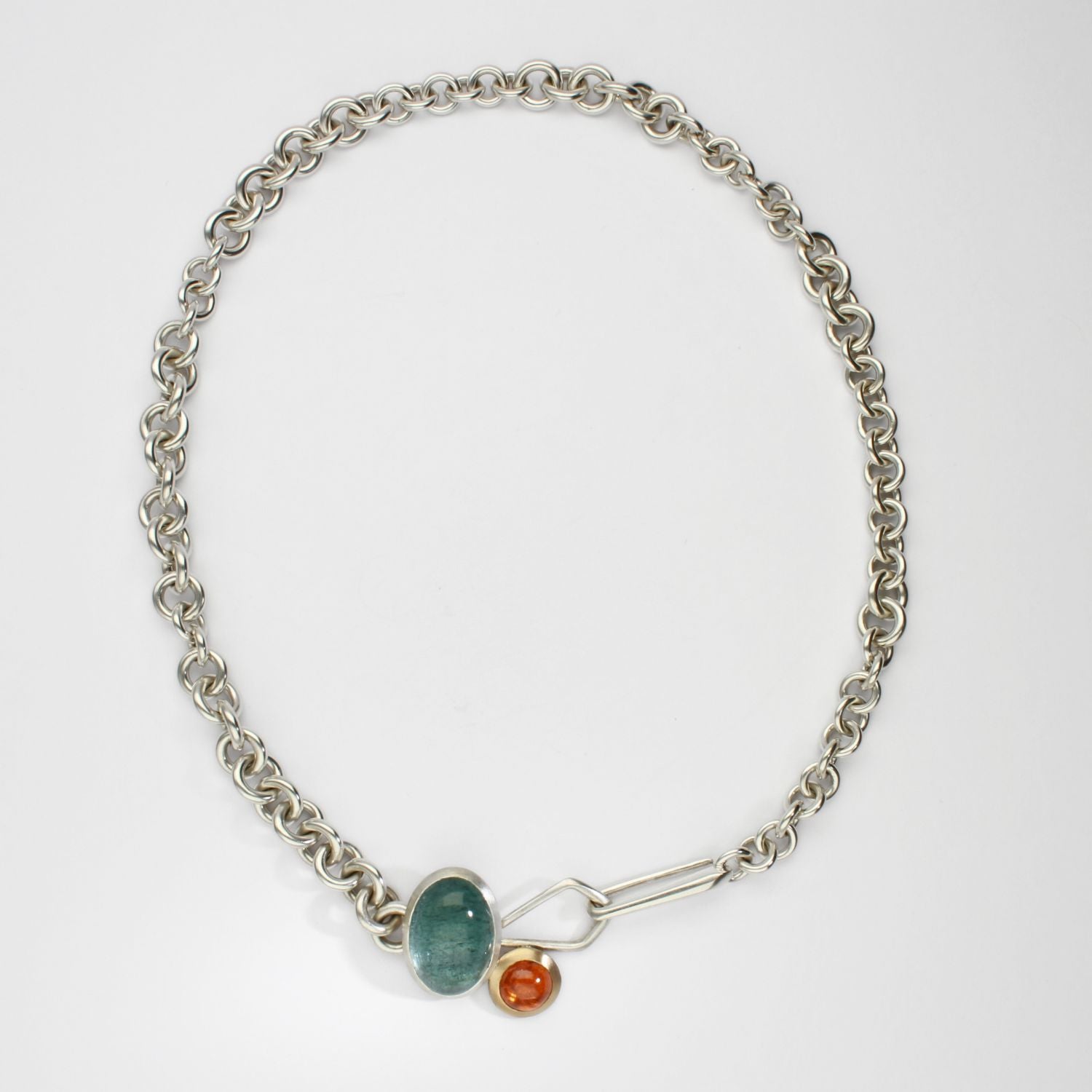Camur heavy-weight necklace with aquamarine & mandarin garnet silver & 18ct gold by Emily Thatcher
