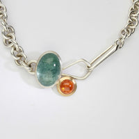 Camur heavy-weight necklace with aquamarine & mandarin garnet silver & 18ct gold by Emily Thatcher