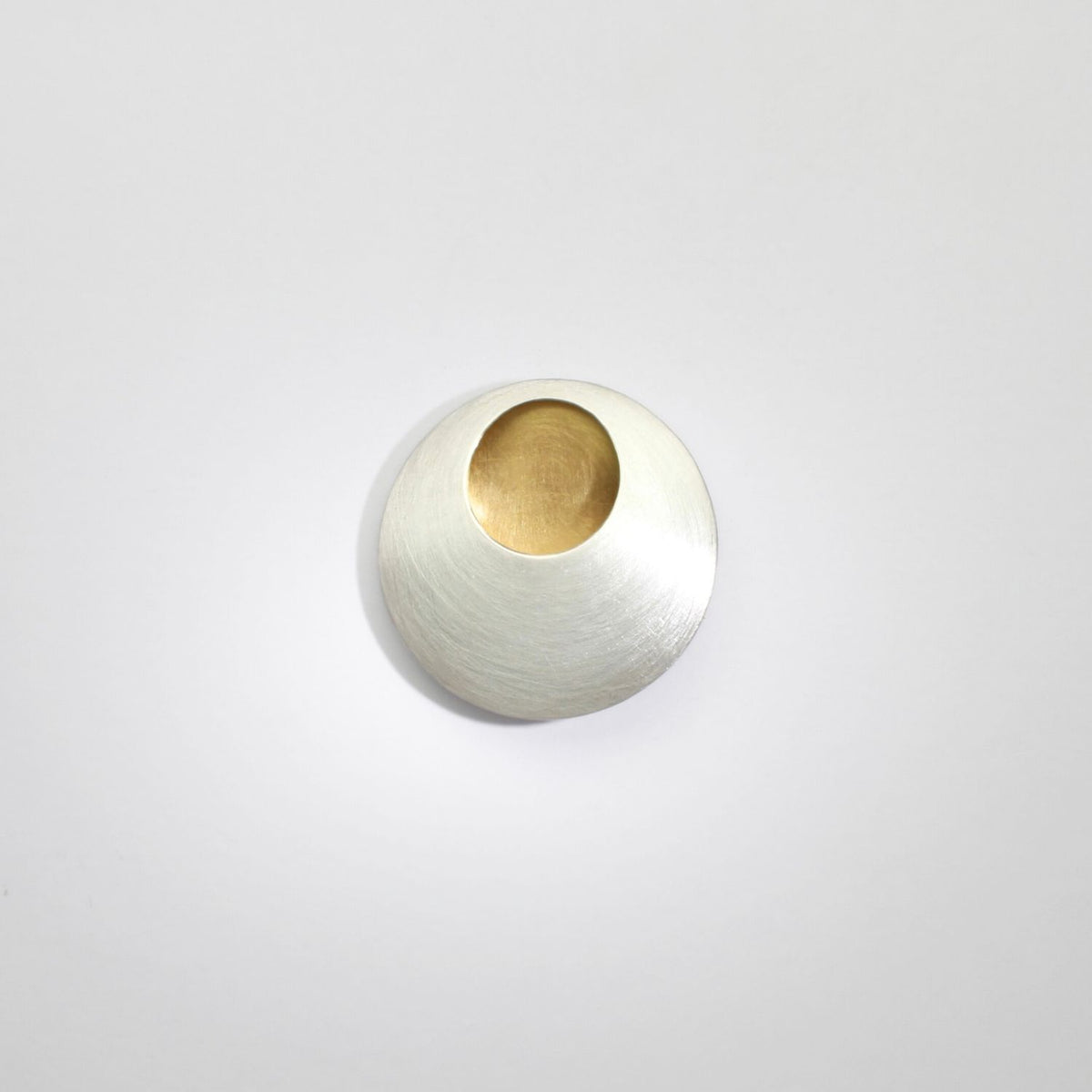 Pebble silver & gold plated brooch by Hannah Souter