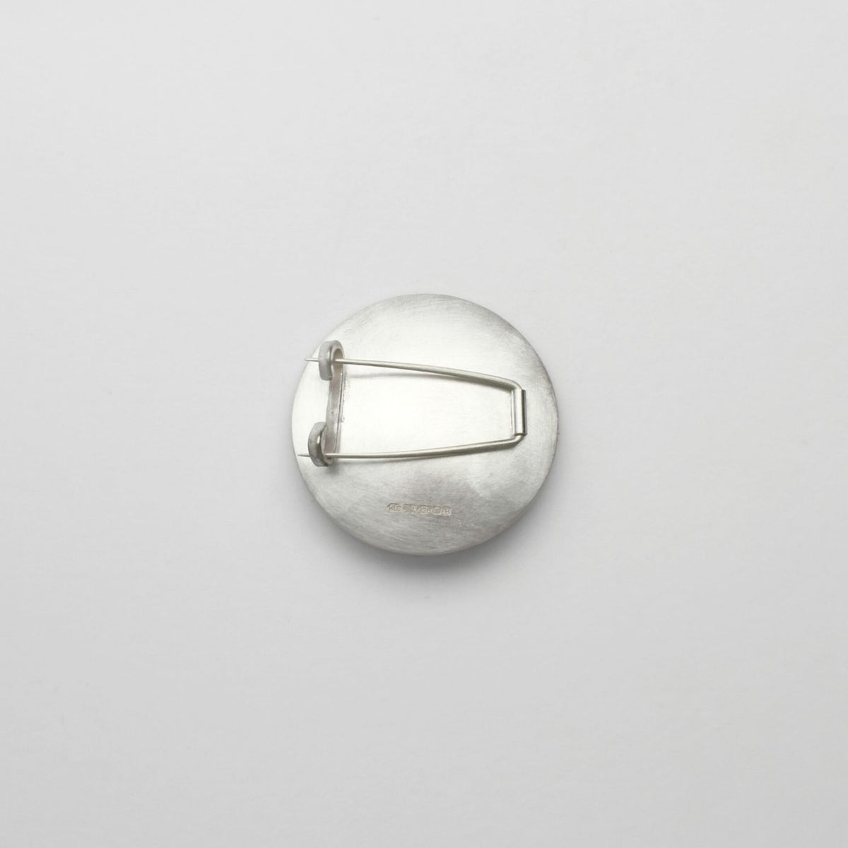 Pebble silver & gold plated brooch by Hannah Souter