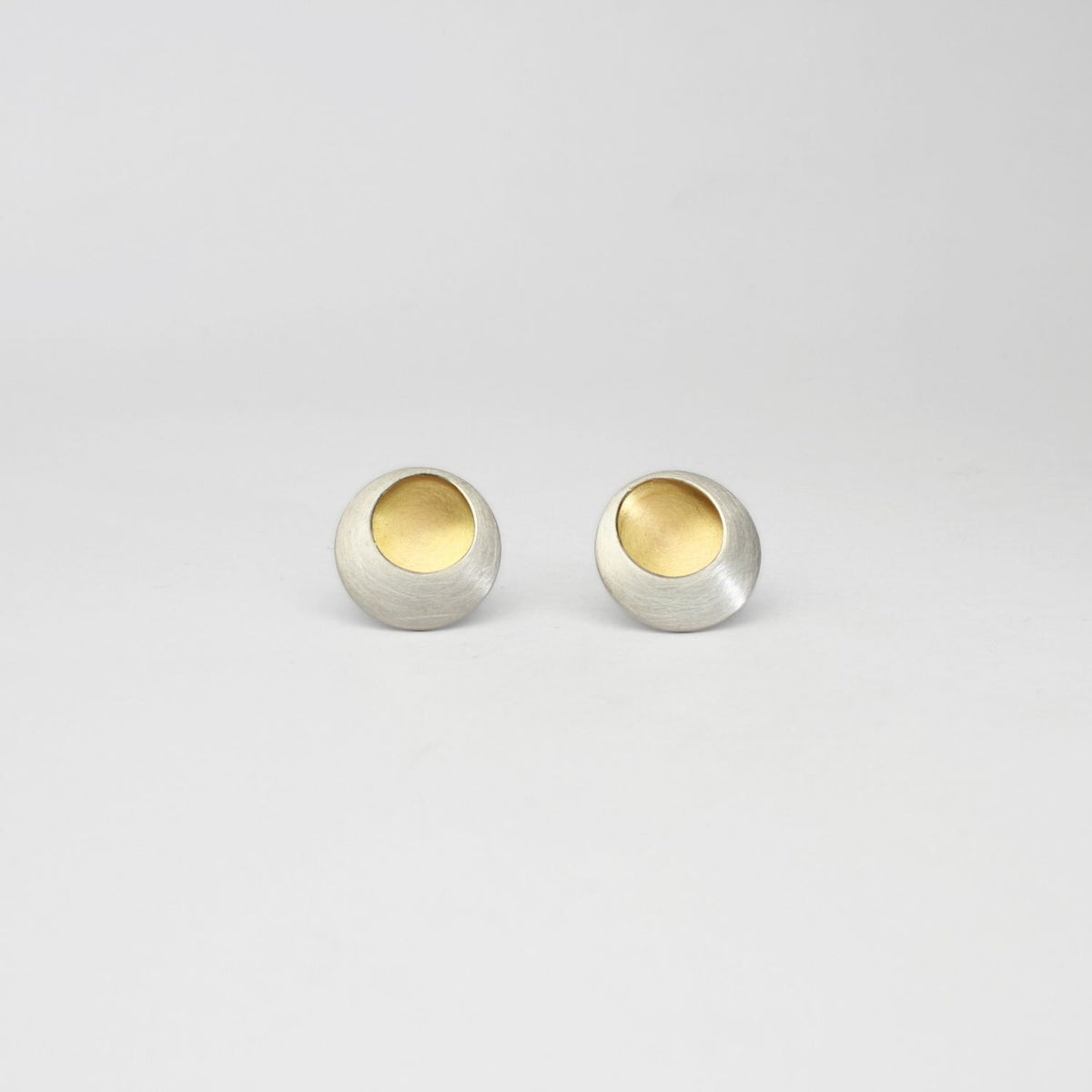 Pebble satin silver & gold plated studs by Hannah Souter