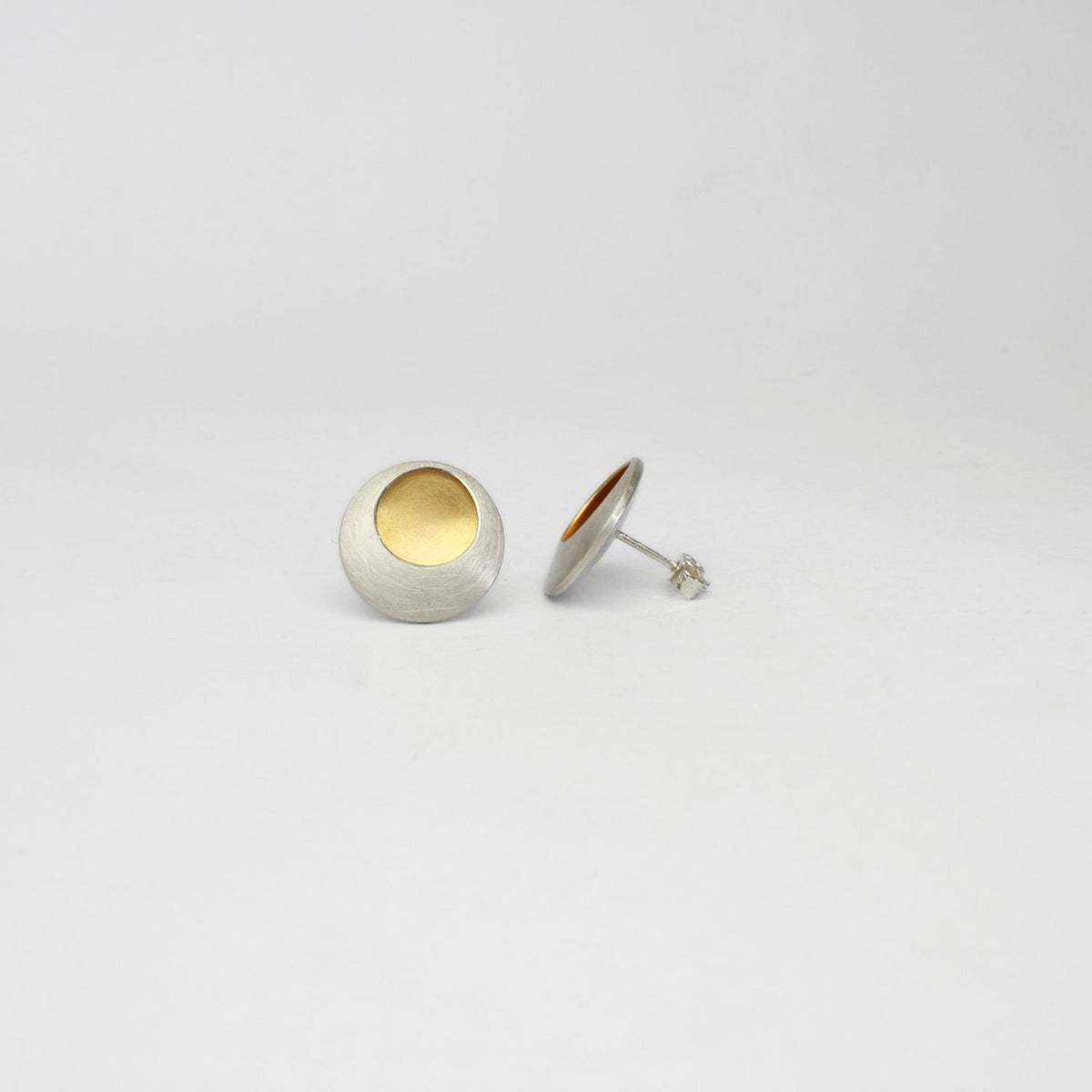 Pebble satin silver & gold plated studs by Hannah Souter