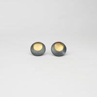 Pebble satin black silver & gold plated studs by Hannah Souter