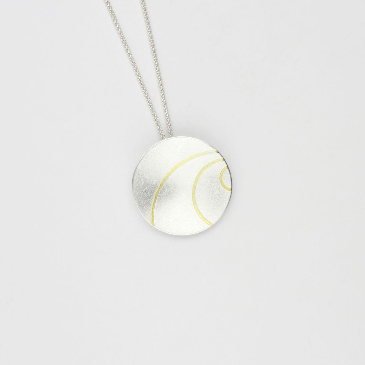 Large lunar 3 satin silver & 18ct gold pendant by Hannah Souter