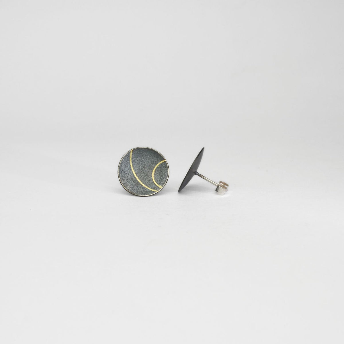 Large lunar 2 satin black silver & 18ct gold studs by Hannah Souter
