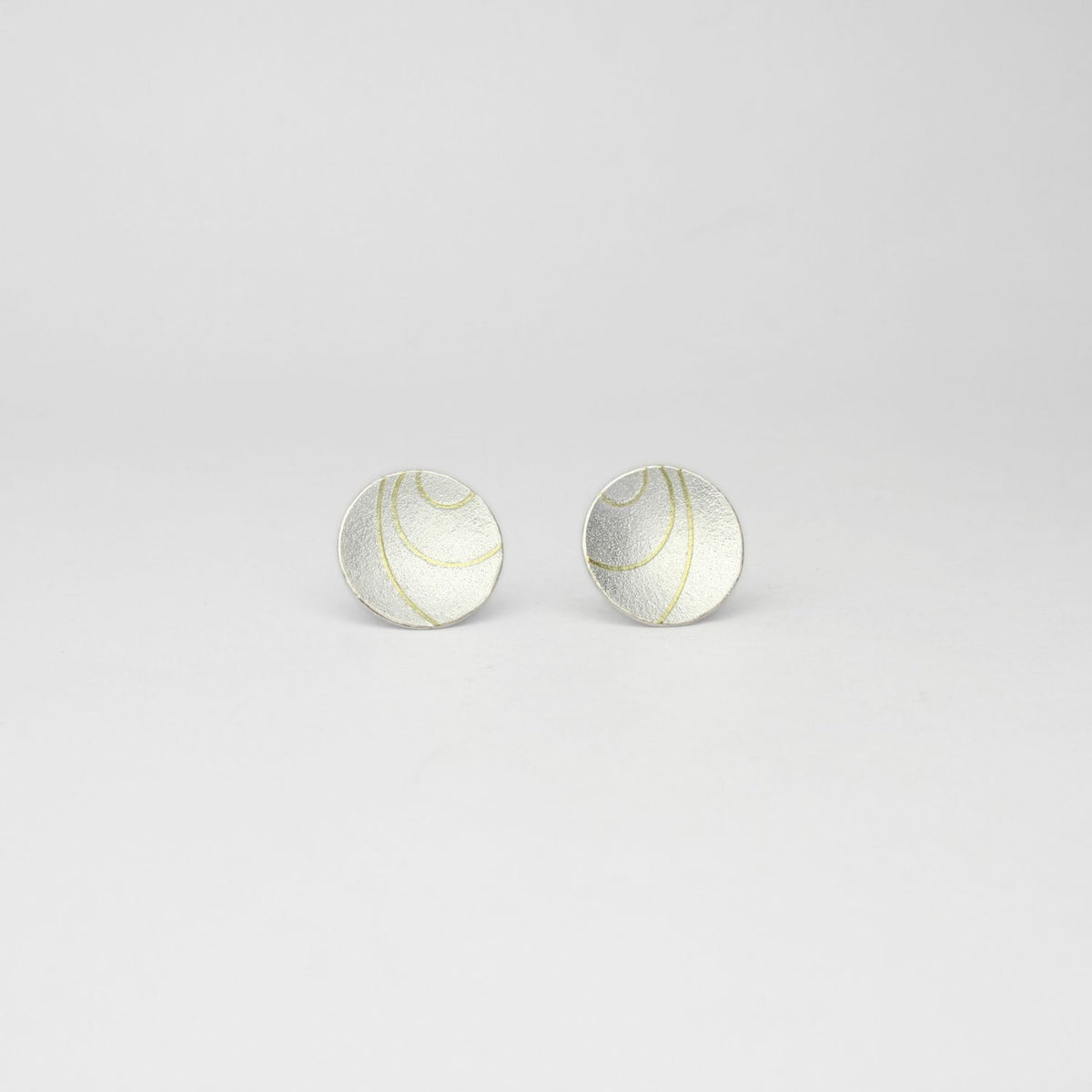 Large lunar 3 satin silver & 18ct gold studs by Hannah Souter