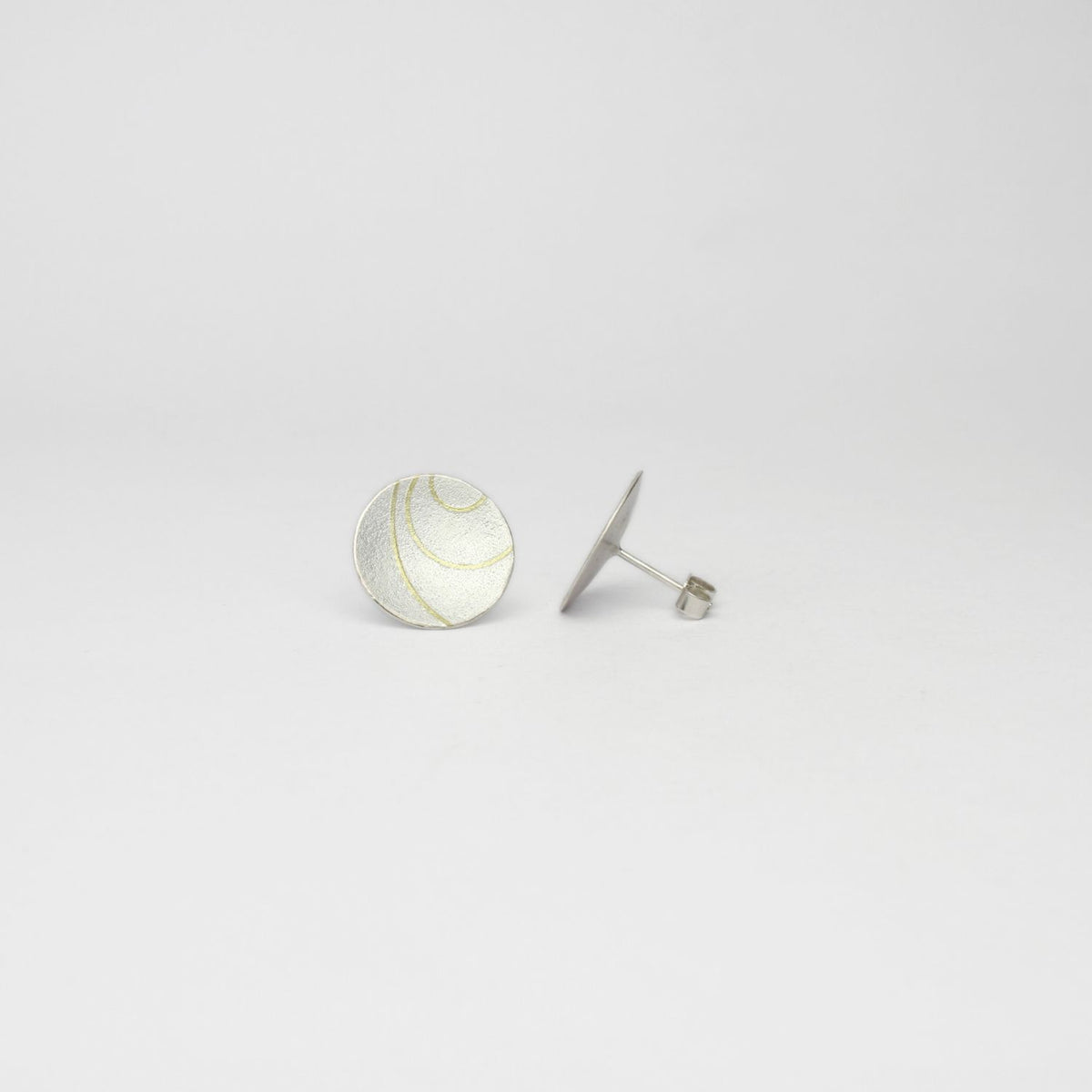 Large lunar 3 satin silver & 18ct gold studs by Hannah Souter