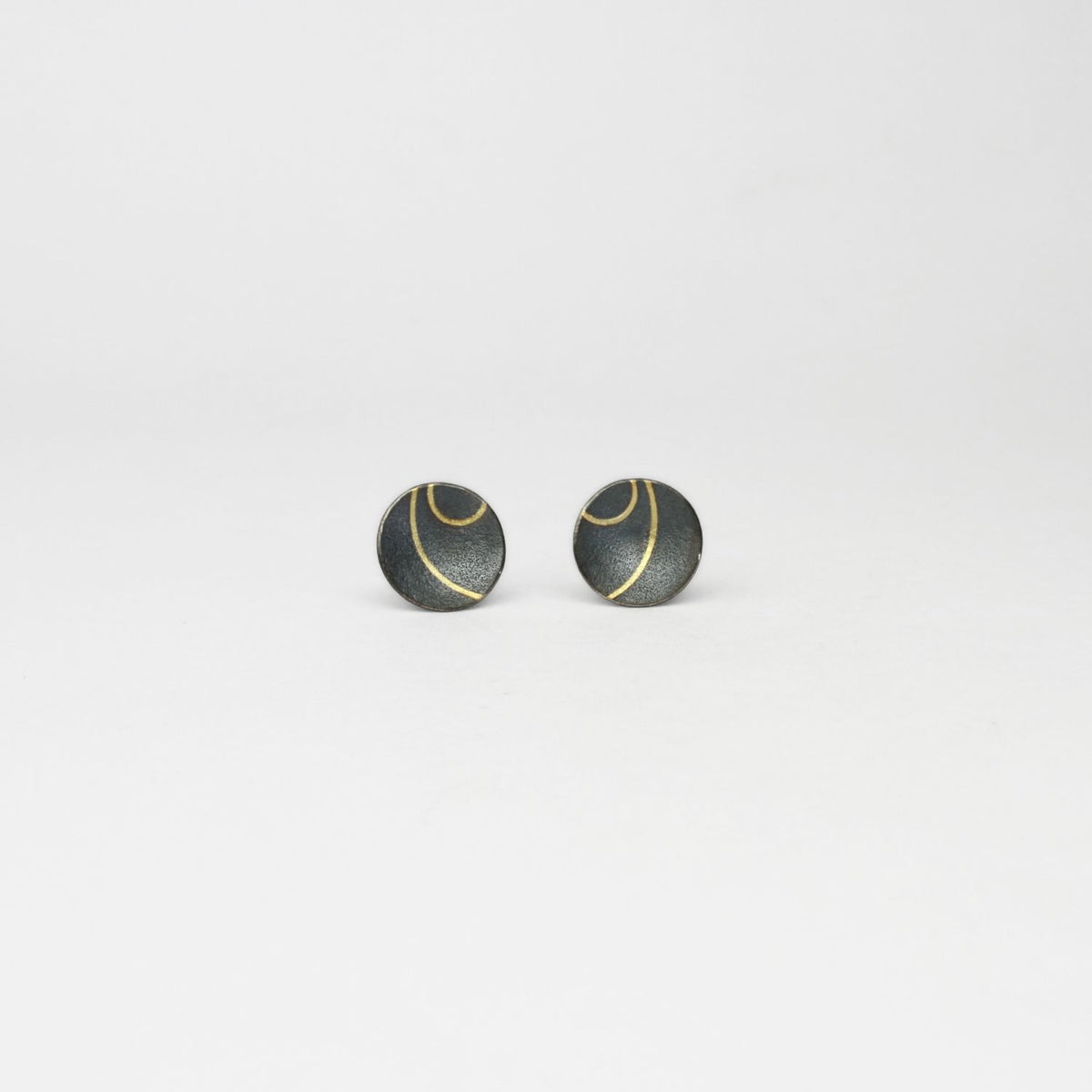Medium lunar 2 satin black silver & 18ct gold studs by Hannah Souter