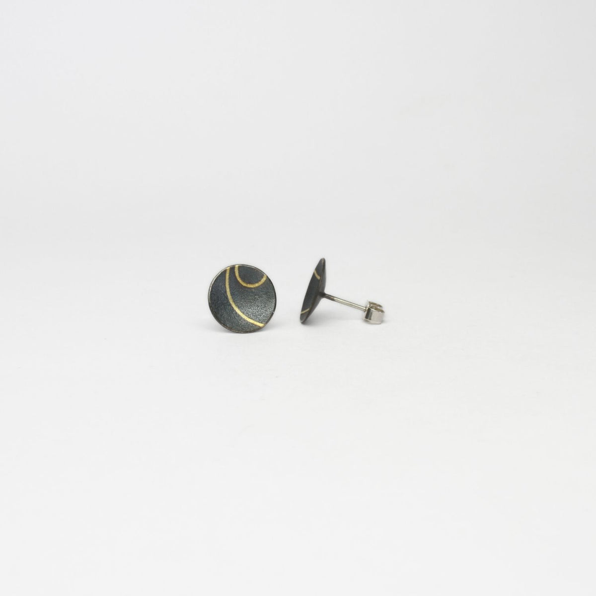 Medium lunar 2 satin black silver & 18ct gold studs by Hannah Souter