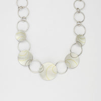 Lunar multi dome silver, 18ct white gold & 18ct yellow gold necklace by Hannah Souter