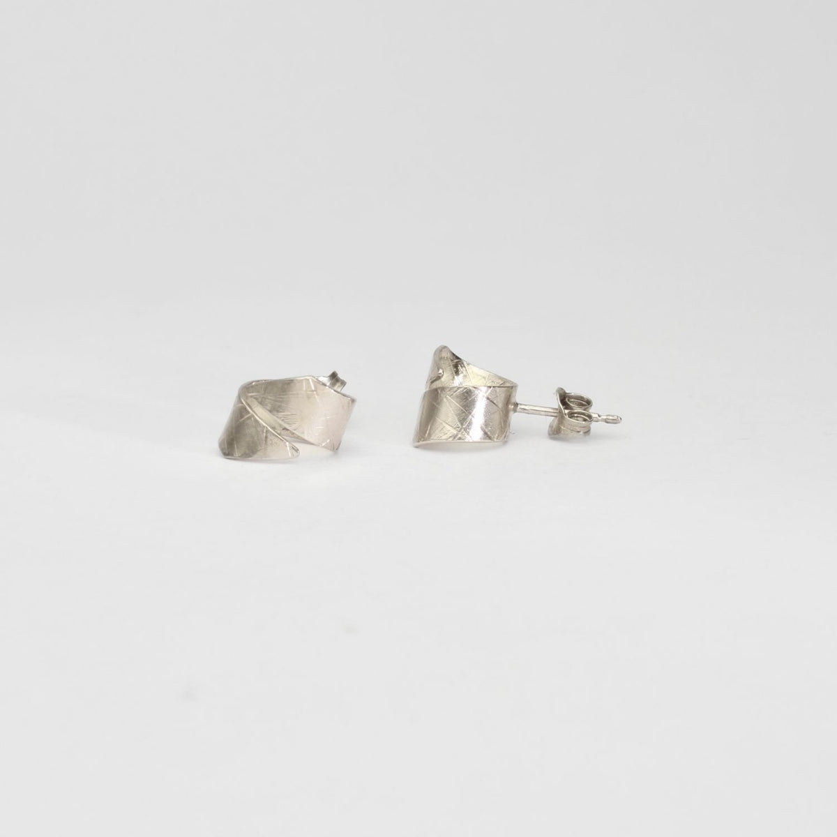 Ribbon end silver studs by Jodie Hook