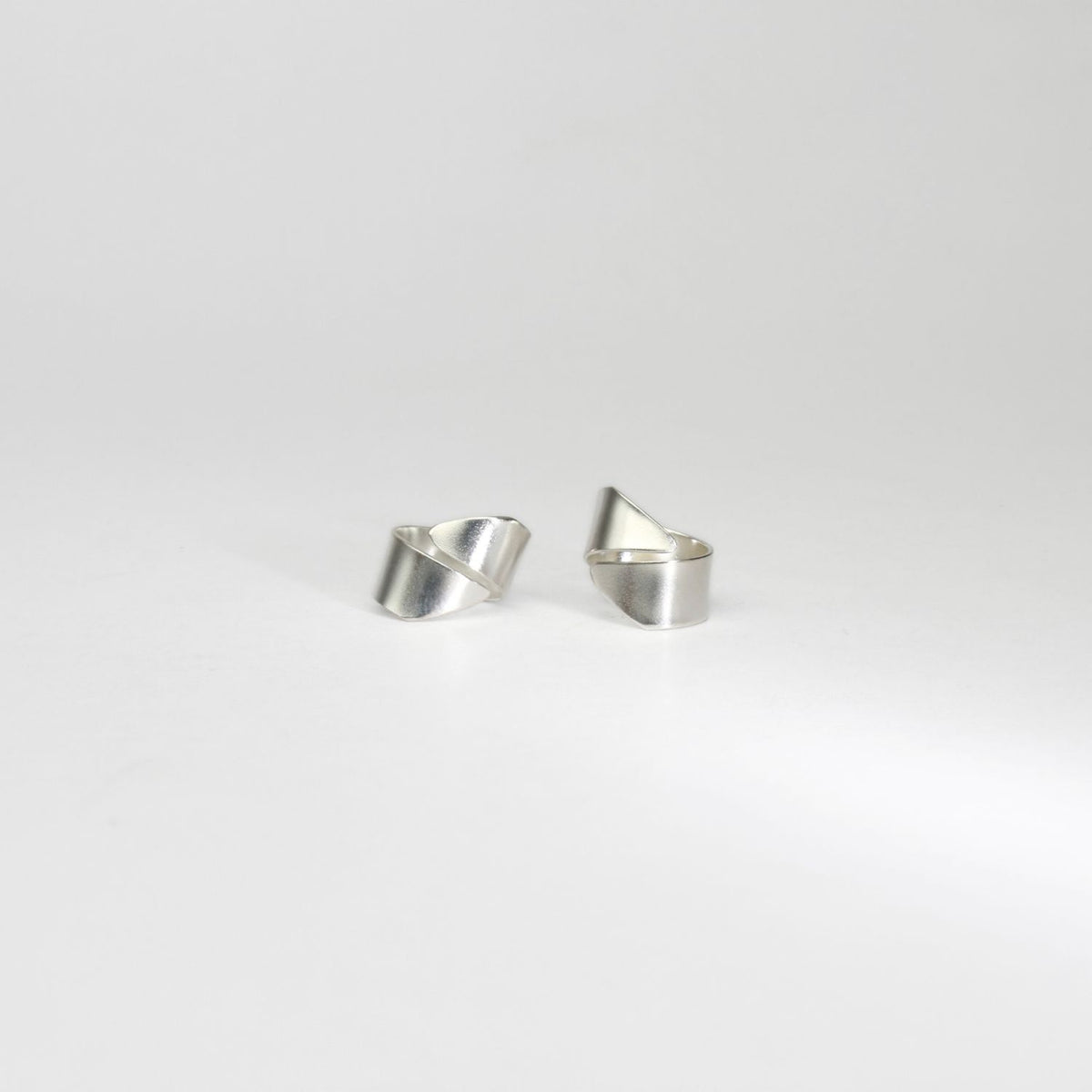 Ribbon end silver stud earrings by Jodie Hook