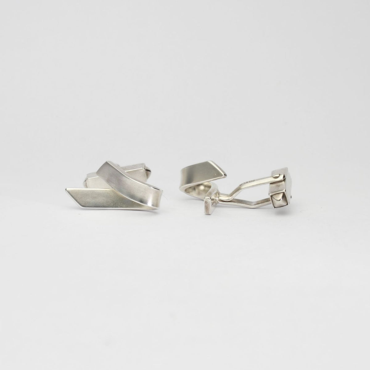 Ribbon fold cufflinks in silver by Jodie Hook
