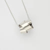 Large ribbon knot pendant in silver by Jodie Hook