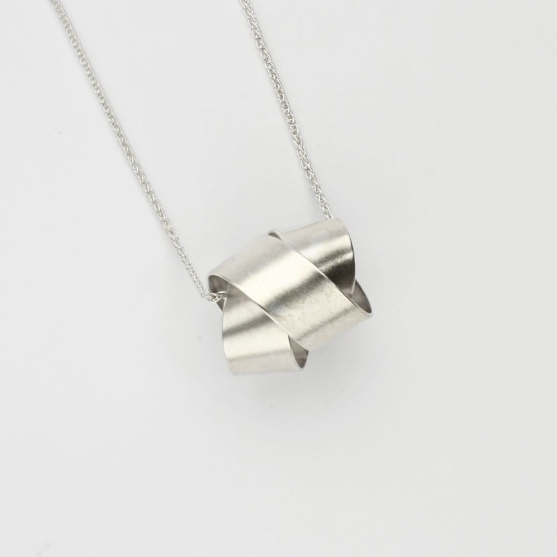 Large ribbon knot pendant in silver by Jodie Hook