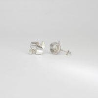 Ribbon knot tied silver stud earrings by Jodie Hook