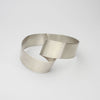 Silver ribbon loop bangle by Jodie Hook