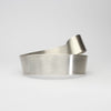 Silver ribbon loop bangle by Jodie Hook