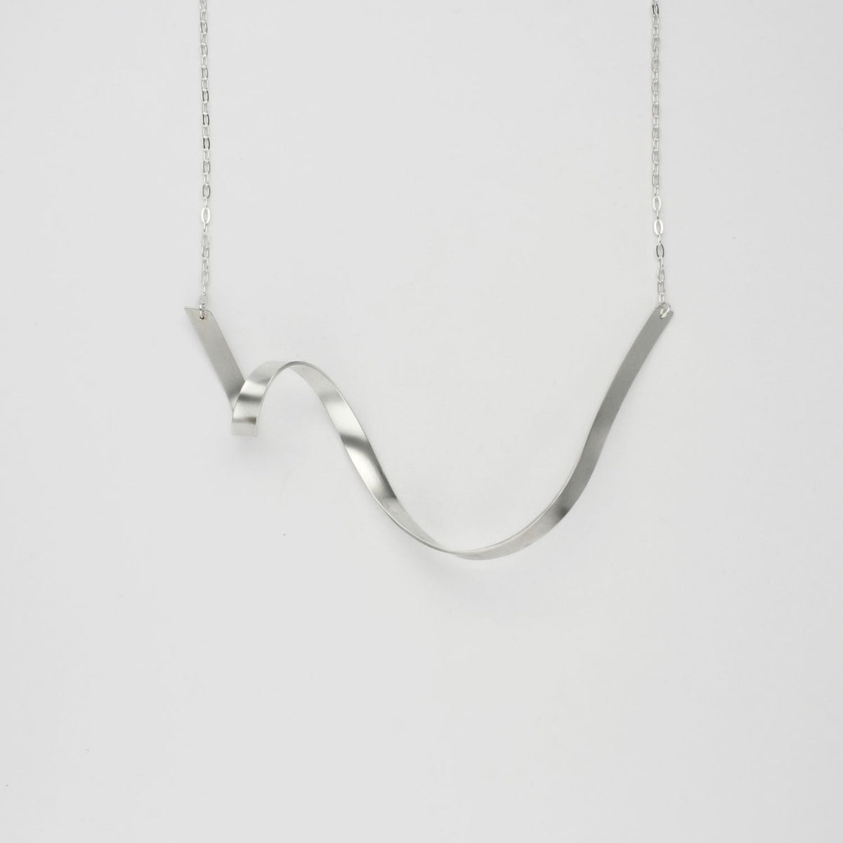 Ribbon loop V silver necklace by Jodie Hook
