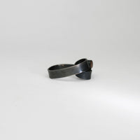 Ribbon solitaire loop black silver ring with imperial topaz by Jodie Hook