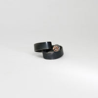 Ribbon solitaire loop black silver ring with imperial topaz by Jodie Hook