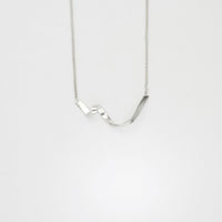 Tiny ribbon loop V silver necklace by Jodie Hook