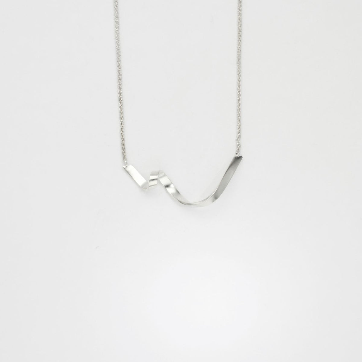 Tiny ribbon loop V silver necklace by Jodie Hook