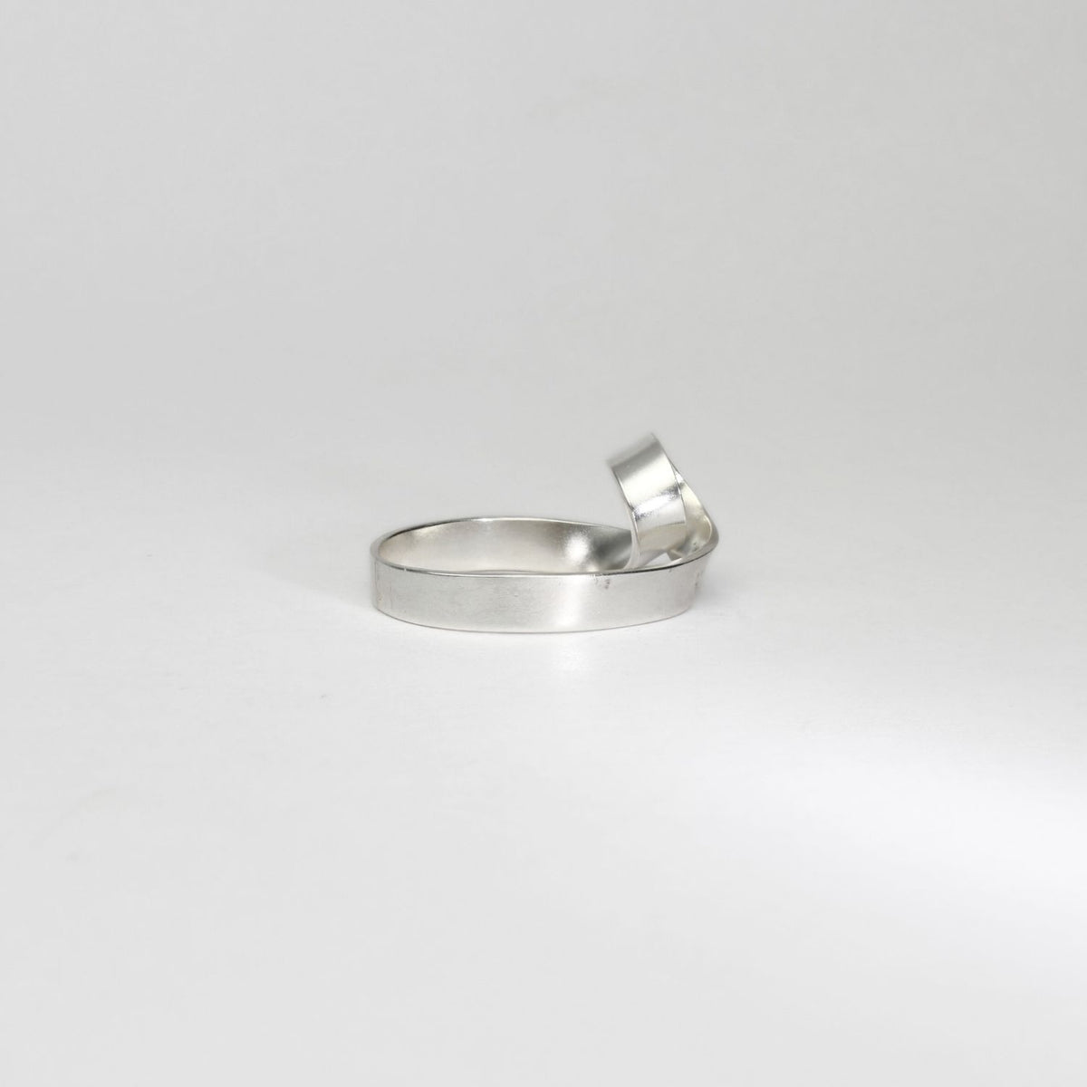 Ribbon twist silver ring by Jodie Hook