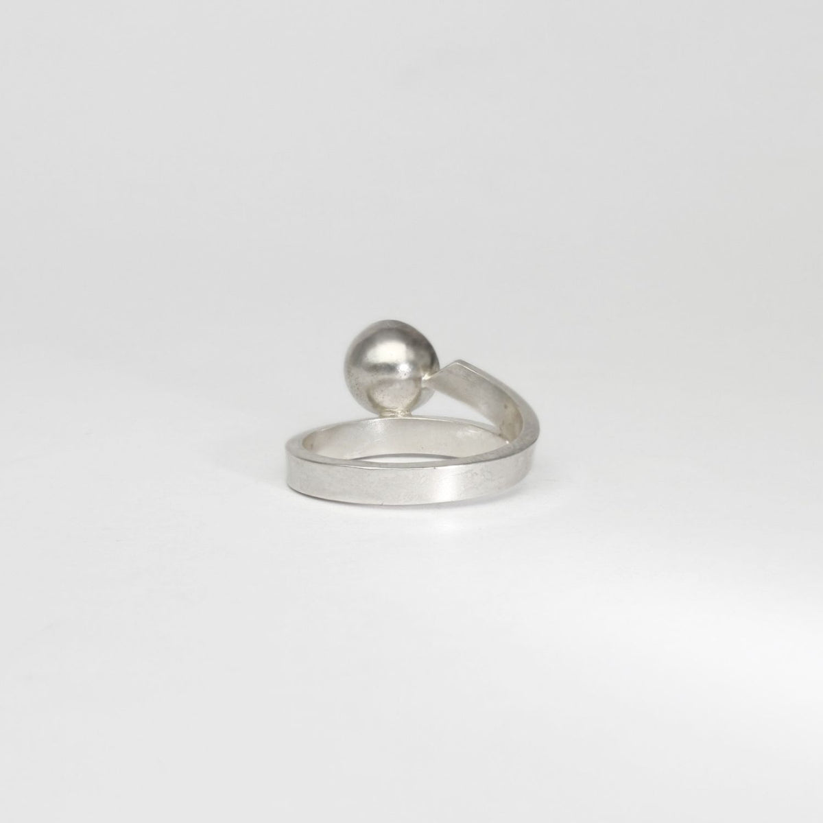Ribbon end silver ring with lavender amethyst by Jodie Hook